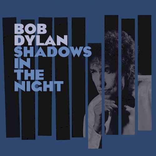 Allmusic album Review : Other peoples songs have long been a staple for Bob Dylan, who first made his name in Greenwich Village by singing folk songs in the early 60s and often returned to old tunes as the years rolled by. Sometimes, hed dip into the pre-WWII collection of standards known as the Great American Songbook, peppering set lists with unexpected selections as early as the 80s and even covering Dean Martins "Return to Me" for The Sopranos in 2001, and hes made no secret of his affection for old-fashioned crooning on the records hes made since 2001s Love and Theft, but even with this long history of overt affection for pre-rock & roll pop, the existence of 2015s Shadows in the Night might come as a surprise. Shadows in the Night finds the songwriter whose work marks the divide where artists were expected to pen their own material finding sustenance in the Great American Songbook, with every one of its songs recorded at some point by Frank Sinatra. Its songs are old and Shadows in the Night is appropriately a defiantly old-fashioned album: a record the way they used to make them, long before Dylan had a recording contract of his own. Archaic though it may be -- its a mere ten songs lasting no longer than 35 minutes, just like all the long-players of the 50s -- its hard to call it musty, not when Dylan invested considerable energy in adapting these songs to the confines of his five-piece road band. Occasionally, this roadhouse crew is augmented by horns but the brass coloring bleeds into the sweet, mournful slide of Donnie Herrons pedal steel, accentuating that these renditions arent nostalgic covers but reflections of Dylans present. His voice shows gravelly signs of wear but he knows how to use his weathered instrument to its best effect, concentrating on the cadence of the lyrics and digging deep into their emotional undercurrent. In that sense, Shadows in the Night is a truer Sinatra tribute than the stacks of smiling, swinging empty tuxes snapping along to "It Had to Be You," for Dylan inhabits these songs like an actor, just like Frank did way back when. What Dylan is saluting is not the repertoire, per se -- none of these songs is heavily associated with the Chairmen of the Board -- but rather the mournful intimacy of Sinatras "saloon" songs, the records he made to be played during the pitch black of the night. Four of the songs here can be found on 1957s Where Are You?, one of the very best of its kind, and that connection accentuates how Dylan has made a saloon song album with a band that could be heard at a saloon: just a guitar quintet, taking a moment to breathe, sigh, and perhaps weep. The fact that the feel is so richly idiosyncratic is a testament to just how well he knows these tunes, and these slow, winding arrangements are why Shadows in the Night feels unexpectedly resonant: its a testament to how deeply Dylan sees himself in these old songs.