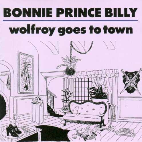 Allmusic album Review : Bonnie "Prince" Billy fans looking for a return to the surprisingly ornate, Grateful Dead-inspired country-folk of 2009’s Beware may come away a tad disappointed in the ultra-sparse yet warm and winning Wolfroy Goes to Town. The ten songs, nearly all of which arrive via guitar, bass, and Oldhams weathered croon, feel lived in and coveted. It’s typical Oldham fare, with highlights coming from opener “No Match,” which builds to a powerful, harmonious climax, and the nearly seven-minute “Black Captain,” an epic yarn of nobility and heartache that sounds like it’s been around for a century or two. Coming off like a murkier, more intimate version of 2010’s Wonder Show of the World with the Cairo Gang, Wolfroy’s all about lonesome beauty, and the idiosyncratic wordplay that has become Oldhams forte since settling on the Bonnie “Prince” Billy moniker.