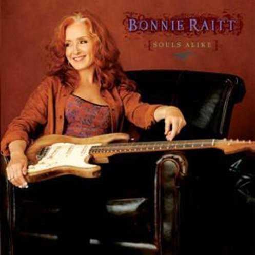 Allmusic album Review : Souls Alike is the first album in Bonnie Raitts 18-disc catalog to bear her own name as producer with some assistance from Tchad Blake. It is also the first album in her career absent a 12-bar blues. Gone are the big washes of sound that Don Was added to her Grammy-winning recordings, and the sound Raitt has chosen for herself is a bit edgier, far more adventurous than Silver Lining, her last studio offering produced by Blake. Guitars -- courtesy of the artist and George Marinelli -- dominate, and are accented by Jon Clearys Hammond B3, which paints the entire proceeding with a solid, somewhat funky yet outsider soul feel. Raitt keeps everything close to the vest this time out. Her road band and a handful of guests who include Mitchell Froom, Maia Sharp, David Batteau, and Sweet Pea Atkinson carried this project to fruition. Whats most remarkable about Souls Alike is its songs and their focus on broken love, acceptance of responsibility, and the willingness to transcend. Cleary, Sharp, and Batteau wrote a number of tracks, as did John Capek, who provides drum loops on some cuts. Its all in the family for the most part. The songs themselves reflect on self-determination (the gorgeous title cut) in Raitts trademark rock ballad style, Randall Brambletts greasy, dark and slinky "God Was in the Water," the angular, ultra-modern "Crooked Crown," the grimy New Orleans second-line groove of Clearys "Unnecessary Mercenary" with a killer slide break by Raitt and an off-the-rails piano by Cleary. Then theres the near-trip-hop of "Deep Water," a deeply sensual tune that is a shock on first listen but infectious thereafter. "The Bed I Made," by Sharp and Batteau is the albums closer. With a shimmery loop and Raitts finest vocal on the set, its a faux jazz-ballad that is unsettling, full of bittersweet regret and the willingness to embrace the face in the mirror and the mistakes as a way of moving through pain. Its a rather unsettling way to end an album, but then, this entire disc is brave and sharp. It marks a new turn for Raitt and offers her and her fans an entirely new road to go down -- this one deep into the heart.