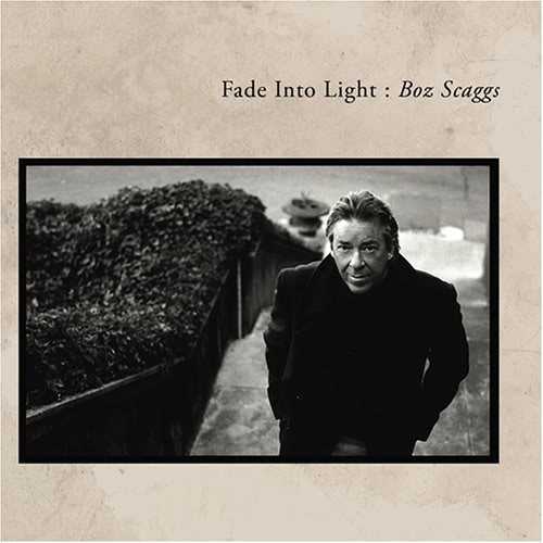 Allmusic album Review : Fade into Light is a stellar album. It features unplugged and redone performances from Scaggs classic Some Change, Silk Degrees, and Middle Man, as well as some new tunes. The unplugged tunes include readings of "Dirty Lowdown" and "Simone." "Harbor Lights" is changed significantly as well, in that the disco riff in its ending has been replaced by smooth jazz. "Sierra" is a remarkable redo that gives the tune a completely different feel. "Just Go" has Scaggs playing almost everything on the track, and it is one of his most nakedly emotional performances committed to tape. The sheer brokenness in his voice reveals a depth and dimension in the performance that takes the listener deep into the lyric. It is followed by a sultry, nocturnal read of "Love T.K.O." that reveals his deep authority, allowing the lyric to speak through him, not because of him. There is an authority here that allows the vast emotion in the song to be read through the spirit of acceptance, and it all lies in his nuance and phrasing. Its so inspired, offering a view of the many sides of Scaggs as a singer, that Fade into Light is a must for anyone even remotely interested in Boz Scaggs.