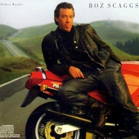 Allmusic album Review : When Boz Scaggs released Other Roads in 1988, hed been off the scene for a full eight years. Produced by Bill Schnee, it featured some of his most unlikely songwriting collaborations with instrumental backing by Toto along with some studio aces. Scaggs tried hard to walk a line between the decades obsession with more processed studio sounds that utilized electronic keyboards and drum machines up front, while relying more heavily on electric guitars and kit drums. He doesnt always succeed in keeping the balance, but the attempt sets him apart from most mainstream acts at the time. Other Roads is odd from the start: the opener, "Whats Number One?" is a spacey pop number written with the late poet and songwriter Jim Carroll and bassist/arranger Marcus Miller. "Right Out of My Head," written with Dan and David Huff, juxtaposes Steve Lukathers blistering guitar work against a synth fill right out of Gary Numans "Cars." Scaggs nailed another number one with "Heart of Mine" co-written with pop-jazz songwriter Bobby Caldwell (and the only cut produced by Stuart Levine). Theres a strange futurist club noir inherent in both "I Dont Hear You" and "Crimes of Passion" written by Carroll and the Huffs. "Cool Running" written by Scaggs with Patrick Leonard is a solid, grown up, island groover with staggered R&B; horns contrasted with a female backing chorus and a bridge of vocal counterpoint. "Claudia," by Steve Williams is one of Scaggs classic mid-tempo, broken love songs with a killer bridge, and stellar guitar work by Lukather. The set closer is a dreamy adult pop ballad entitled "The Night of Van Gogh," co-authored by him, Caldwell and Peter Wolf. Scaggs was in top vocal shape when he cut this: cool, bemused, but able to capture and communicate emotion mellifluously with freeze frame accuracy. While Other Roads didnt scale the charts as an album, and is regarded as a minor work, hearing it in the 21st century reveals Scaggs ambition and vision reach outside the box in a collection of great songs -- even if the production doesnt fare as well as the material.