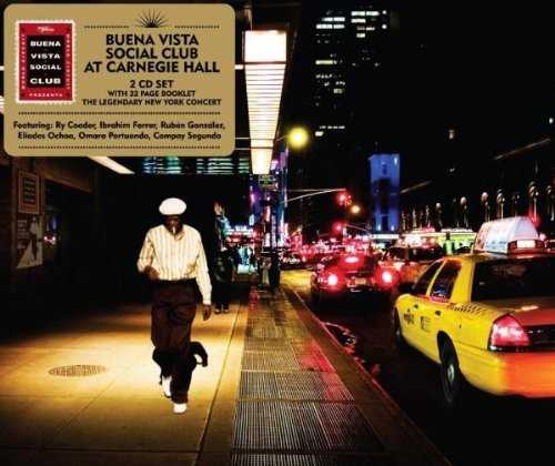 Allmusic album Review : It seems very strange that World Circuit/Nonesuch would wait ten long years to issue this historic document of the grand, wildly celebrated Buena Vista Social Club concert at Carnegie Hall. This is the very show so wonderfully and artfully detailed by filmmaker Wim Wenders in his documentary on the project that reunited these then-obscure Cuban music legends for an album and a tour and catapulted them to worldwide fame. Perhaps it was worth the wait; perhaps this music should have been in our midst all along. Of the four older legends, those who had made music together in Cuba before Castro, only Omara Portuondo remains on the Earth, and she is still quite active. The other three, vocalist Ibrahim Ferrer, pianist Rubén González, and guitarist and vocalist Compay Segundo, have passed away -- Segundo lived to be 96! The youngster of the group, guitarist Eliades Ochoa, continues to record and tour.<br><br> One thing the music on this lavishly packaged double-disc set does accomplish, however, is reveal without doubt that the music in the film is as profound, sensual, and beautiful as it was when accompanied by images. It is true that eight of the songs that appeared on the eponymous studio album are replicated here, but these live versions blow them away. In addition, the 16 songs here, covering two full discs, offer extended instrumental workouts to go along with the glorious vocals, making each tune -- from the opening "Chan Chan" all the way through to the glorious bolero "Silencio" duet between Ferrer and Portuondo -- reflect all of the lived history not only of the singers, but of the entire era for an audience to behold. Segundos rich and lived-in baritone inhabits disc twos opener, "Orgullecida," so fully that no one should ever be allowed to cover it again. As is the standard for Nonesuch, the sound of the evening is fantastic, the spark in the mix has been left in, and the backing band sounds as varied and tight as it did in the film. The enclosed booklet contains Jon Pareles original New York Times review of the performance and reminiscences from many of those involved in the evening, including Omara Portuondo and producer and backing guitarist Ry Cooder. This set is every bit as necessary as the solo albums by the singers, and perhaps even more than the studio effort. It is not only a historical document; it is a living, breathing piece of work that guarantees the transference of emotion from tape to listener, and cements the Buena Vista Social Clubs place not only in the Latin music pantheon, but in the larger context of popular music history.