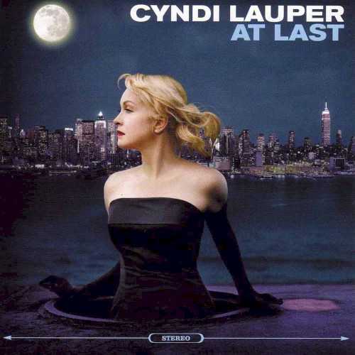 Allmusic album Review : As the girl who just wants to have fun, Cyndi Lauper became an 80s music icon with her flamboyant style, powerful baby-doll voice, and quirky songs, but as time and tastes moved on, her playful persona wore thin and attempts at becoming a more serious artist failed to regain her dwindling audience. With At Last, Lauper steps even further away from that playful image to become the girl who just wants to sing as she tackles a set of pop standards that showcase her underrated voice. Although occasionally shrill and reckless, Laupers forceful tones can be quite moving and awe-inspiring when corralled into the proper setting, as with her bluesy take on Etta James "At Last." With its lazy tempo and minimal arrangement, Lauper is able to relax and convey the lyrics in one of her most mature and affecting performances. Even more low-key is the whisper quiet of "Walk on By," in which she turns Dionne Warwicks midtempo gem into a dark tale of mourning by sadly singing the lyrics over a crawling tempo. Getting a Tori Amos-style ballad treatment is the Animals "Dont Let Me Be Misunderstood," which lets Laupers rock roots rise to the surface with her edgy performance. While some of her song choices work, others fall flat, like "La Vie en Rose," in which her slightly ragged reading is too rough for the delicate song. Also misfiring is her corny duet with Tony Bennett, "Makin Whoopee," where the voices of these two New Yorkers clash like stripes and plaids. Lauper also has a little too much fun with Maurice Williams & the Zodiacs "Stay," as she reverts back to her boisterous voice of yesteryear and disrupts the mature tone of the disc. Although the results are mixed, At Last does focus on Cyndi Laupers best asset -- her voice -- and may help to rejuvenate a career in which the personality unfortunately overshadowed the talent.