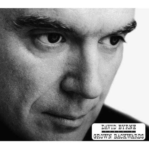 Allmusic album Review : David Byrne, like fellow New York transplant David Bowie, has reached a well-deserved apex in his career. After eight post-Talking Heads solo outings, the eccentric composer, songwriter, artist, and world music entrepreneur has transcended the inconsistencies of his previous efforts and created a genuinely moving and wickedly fun record. Like Bowies Heathen and Reality, Grown Backwards is a mature work by an icon who has come to terms with his past, present, and future, and theres a joy in the simple act of creativity here that gives even the heaviest of subject matter an effervescent charm. Opening with "Glass, Concrete, and Stone," Byrne finds the perfect middle ground between his orchestral epic The Forest and the South American-inspired Rei Momo -- in fact, its the latter that informs many of Backwards arrangements. Texas-based chamber group the Tosca Strings feature on nearly every track, giving the more experimental cuts a much needed fluidity, especially on the arias Un Di Felice, Eterea, from Verdis La Traviata, and Au Fond du Temple Saint, a duet from Bizets The Pearl Fishers. Its no great surprise that the shape-shifting Byrne has chosen opera as his latest foray, but what is surprising is that it works. The Bizet duet in particular, featuring Rufus Wainwright, is lent an emotional resonance by the juxtaposition of the pairs wildly different vocal styles -- when they finally meet in harmony its like two Central Park bums behind Tavern on the Green, clinking their 40-ounce bottles and weeping into a dumpster beneath a sea of summer stars. The wonderfully acerbic "Empire," with its refrain of "The weak among us perish," is Byrne at his political best, emphasizing the "play" in wordplay like a sinister Paul Simon. While by no means a protest record, it bristles with liberal wit and social commentary, especially on the Broadway-style "The Other Side of This Life," a hilarious and scathing jab at the entertainment empires and their minions. "Tiny Apocalypse" finds Byrne at his surreal best, nearly rapping the lyrics "A three-tone carpet and a Jackie Chan spear/lookin at a hairdo and a bellyful of beer/well, I aint no poet, aint got no rhyme/but I got me a car and I know how to drive" over an easy Tropicalia groove. As with many of the prolific artists releases, the record could be trimmed by five or six songs, but fans have grown accustomed to these aberrations -- which are still of higher quality that many in the industry -- and are willing to either let them go or let them grow. While by no means perfect, Grown Backwards is the colorful, multiethnic sound of a New York City enthralled with itself, and like a select few of the Big Apples denizens, Byrne is a perfect conduit for its love.