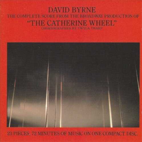 Allmusic album Review : Since the breakup of Talking Heads, David Byrnes solo work has been notoriously inconsistent. But before that bands dissolution, he made a couple of very fine albums on his own: My Life in the Bush of Ghosts (with Brian Eno) and The Catherine Wheel, a musical score commissioned by Twyla Tharp to accompany her dance project of the same name. Byrnes score is always interesting and frequently brilliant; it draws on the instrumental talents of such session greats as drummer Yogi Horton, percussionist John Chernoff, guitarist Adrian Belew (who had been recording and touring as a sideman with Talking Heads), and, inevitably, Eno. Hortons drumming establishes a muscular funk foundation for much of the material, which also showcases Byrnes underrated guitar playing. Only the lyrics disappoint; they consist almost entirely of clichéd and predictable depictions of domestic suburban angst. Highlights of the program include "The Red House," with its eerie use of deconstructed vocal samples, and the lovely faux-juju "Ade." Highly recommended.