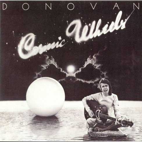 Allmusic album Review : Cosmic Wheels was Donovans first album in three years to be aimed at mainstream listeners (as opposed to the audience of children and parents for HMS Donovan). For most onlookers, the passage of time meant that this record should have differed considerably from its predecessor, but no one could have expected what was on Cosmic Wheels, at least on side one -- a suppression of all of the flowing lyricism that had been a hallmark of Donovans previous work. In its place were awkward self-consciously heavy prog rock/hard rock stylings juxtaposed with sound effects, and all woven together in a loud and mostly tuneless and unmemorable first side. Starting with the title track, little of the new-style material worked, and the first six numbers here seem like the musical equivalent of a train wreck in slow motion -- the presence of such notable names as Suzi Quatro and others in the contingent of participating musicians notwithstanding. But the album ended up rescued, or at least partly salvaged, by the acoustic numbers that comprise most of the second side. Overlooking "The Intergalactic Laxative" (the less said about the better), the final third of this record is where any value that it did have, for old listeners at least, resided -- the delightful "Only the Blues" and the ethereal "Appearances," among the most beautiful recordings of his post-60s career, satisfied longtime fans and could even have earned the artist some new ones, and they keep the record from being a total loss. Fine as they are, they may not be quite worth the effort required to reach them, but their presence comprised the only fully worthwhile moments of what was to be a comeback album -- and as theyre not likely to ever turn up on any compilations, their presence ensures that completists and fans will always have to ponder whether to bother owning Cosmic Wheels or not, as opposed to ignoring it completely.