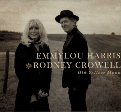 Allmusic album Review : This was a long time coming; given its relaxed execution, one wonders what took so long. Old Yellow Moon is an album of duets between Emmylou Harris and Rodney Crowell. He was a rhythm guitarist and backing vocalist in her Hot Band in the mid-70s. After he left, he continued contributing songs to her recordings for nearly two decades. This marks a reunion of more than just Harris and Crowell. Brian Ahern, who produced her early Warner recordings helms these sessions with Hot Band members James Burton, John Ware, and Bill Payne making appearances, as well as heavy hitters Vince Gill, Stuart Duncan, and Steuart Smith, to name a few. Though recorded in Nashville, the sound of this recording is posited somewhere between the Southern California country sound of the early 70s and some of Music Citys more adventurous sounds in the middle and late years of that decade. The song choices are as eclectic as one would expect. Some of the sets highlights include a smokin redo of "Bluebird Wine," which appeared as the opening cut on Harris classic Pieces of the Sky album. This version has some fine-tuned lyrics in the first two verses -- Crowell was only 21 when he wrote it. The readings of Roger Millers "Invitation to the Blues" and Allen Reynolds "Dreaming My Dreams" are beautifully executed standards. There are three excellent cuts here by Hank DeVito, another original member of the Hot Band. They include the midtempo, hard country opener "Hanging Up My Heart," the bluesy "Black Caffeine," and the title cut, a lilting waltz that closes the record. Crowell also contributed "Open Season on My Heart" (originally recorded by Tim McGraw), the languid pedal steel honky tonk ballad "Here We Are," and the back porch "Bull Rider." Kris Kristoffersons "Chase the Feeling" is given a rumbling, punchy, country-rock treatment here. Harris largely goes it alone on Patti Scialfas "Spanish Dancer," in a radically different reading than the songwriters, but Gills gut string guitar, Jim Hokes spare accordion, and Crowells hushed harmony on the chorus offer a more picaresque take. The only misstep here should have been a natural: Matraca Bergs wonderful "Back When We Were Beautiful," recorded by the songwriter in 1997, feels forced; it lacks the stark drama of the original, replacing it instead it with a nostalgia that isnt true to the song. While this doesnt carry the weight of an "historic" recording, it is thoroughly enjoyable. Harris is in better voice than shes been in years and Crowell is a natural as a duet partner. Lets hope they consider Old Yellow Moon more than just a one-off, "bucket list" album.