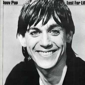 Allmusic album Review : On The Idiot, Iggy Pop looked deep inside himself, trying to figure out how his life and his art had gone wrong in the past. But on Lust for Life, released less than a year later, Iggy decided it was time to kick up his heels, as he traded in the midtempo introspection of his first album and began rocking hard again. Musically, Lust for Life is a more aggressive set than The Idiot, largely thanks to drummer Hunt Sales and his bassist brother Tony Sales. The Sales proved they were a world-class rhythm section, laying out power and spirit on the rollicking title cut, the tough groove of "Tonight," and the lean neo-punk assault of "Neighborhood Threat," and with guitarists Ricky Gardiner and Carlos Alomar at their side, they made for a tough, wiry rock & roll band -- a far cry from the primal stomp of the Stooges, but capable of kicking Iggy back into high gear. (David Bowie played piano and produced, as he had on The Idiot, but his presence is less clearly felt on this album.) As a lyricist and vocalist, Iggy Pop rose to the challenge of the material; if he was still obsessed with drugs ("Tonight"), decadence ("The Passenger"), and bad decisions ("Some Weird Sin"), the title cut suggested he could avoid a few of the temptations that crossed his path, and songs like "Success" displayed a cocky joy that confirmed Iggy was back at full strength. On Lust for Life, Iggy Pop managed to channel the aggressive power of his work with the Stooges with the intelligence and perception of The Idiot, and the result was the best of both worlds; smart, funny, edgy, and hard-rocking, Lust for Life is the best album of Iggy Pops solo career.