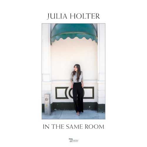 Allmusic album Review : In the wake of 2015s acclaimed Have You in My Wilderness, Julia Holter embarked on smaller projects, including the Bleed for This score and this collection of performances recorded over the course of two days at Londons RAK Studios. In the Same Room inaugurates a series from Domino Records that captures reworked versions of their artists definitive songs, and Holters volume combines the spontaneity of her bands live shows with the meticulous craft of her studio albums. The setting gives her poppier songs more immediacy, with the bassline of Loud City Songs "In the Green Wild" taking on a dancerly sway that, coupled with Holters sing-song delivery, gives the song a whole new mischief. Meanwhile, her dreamier songs have an added presence, whether its the crisp edge the band brings to Tragedys "So Lilies," the lushness of Loud City Songs "Horns Surrounding Me," or the transporting drones of Have You in My Wilderness "Vasquez." Its not surprising that the majority of In the Same Rooms songs come from that album, since these sessions were recorded while Holter was touring in support of it. Even so, these versions of Wilderness songs emphasize the humanity of its dreamy Laurel Canyon pop to different ends; "Feel You" and "Silhouette" are all the more tender, while the mix of beauty and peril on "Lucette Stranded on the Island," "Betsy on the Roof," and "Sea Calls Me Home" is even more precarious. Each of Holters studio albums showcases her skill at transporting listeners into the worlds she creates; on In the Same Room, she brings all of these worlds together in performances that are equally intimate and spectacular.