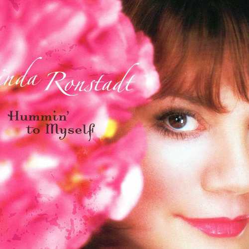 Allmusic album Review : Beginning with her 1983 album Whats New, Linda Ronstadt broke away from the pop/rock world and collaborated with Nelson Riddle on a trilogy of traditional pop standards that were confidently performed and well-received. Riddles satiny arrangements swirled around Ronstadts rich voice as she played the kind of demure chanteuse who might have been headlining at a fashionable nightclub back in the day. The albums were lush and beautifully crafted but by the third album the formula had become tired and the novelty had worn thin. Twenty years later another fading rocker, Rod Stewart, recorded his own highly successful standards trilogy and perhaps it was his success that spurred Ronstadt to revisit the traditional pop catalog once again. Hummin to Myself is basically a throwback to her albums that were throwbacks when first recorded. This time around Ronstadt and arranger Alan Broadbent dispense with the full orchestra in favor of a smaller big band-style combo and this setting actually works in her favor. As a rock vocalist, Ronstadt could growl with the best and there was a certain spark in songs like "Get Closer" that let a listener know that this pretty woman had a slightly naughty side. That spark was appropriately missing from the Riddle albums and with Hummin she has a chance to incorporate a little of her rock bawdiness into her selection of standards. She does this to perfection on "Never Will I Marry," as Frank Loessers jazzy tune showcases a performance that is sassy and one of Ronstadts best covers. To a lesser extent, the title track and "Get Out of Town" have some zest to them, but even with the lighter arrangements, her reliance on ballads like "Cry Me a River" and "Ill Be Seeing You" take up the majority of space and bog down the disc. Even her down-tempo version of "Miss Otis Regrets" completely stifles the songs comedic, yet tragic, story line. Ronstadt was on to something when she dispensed with Riddles orchestrations in favor of Broadbents big-band arrangements, but the spunk shown in a few tunes isnt enough to fully carry the disc. However, with its different approach Hummin to Myself is quite possibly Linda Ronstadts most successful standards outing.