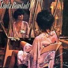 Allmusic album Review : Featuring a broader array of styles than any previous Linda Ronstadt record, Simple Dreams reconfirms her substantial talents as an interpretive singer. Ronstadt sings Dolly Parton ("I Never Will Marry") with the same conviction as the Rolling Stones ("Tumbling Dice"), and she manages to update Roy Orbison ("Blue Bayou") and direct attention to the caustic, fledgling singer/songwriter Warren Zevon ("Poor Poor Pitiful Me" and "Carmelita"). The consistently adventurous material and Ronstadts powerful performance makes the record rival Heart Like a Wheel in sheer overall quality.