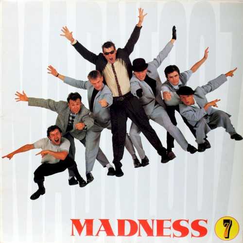 Allmusic album Review : The third album is often where a band makes a great leap forward, and so it is with Madness’ Seven. Although they’re still clearly the same nutty band that tore it up with One Step Beyond, Seven finds the group expanding its horizons considerably, ratcheting up the melodious pop quotient in their songwriting, as well as the distinctly English character sketches. Much of the album comes across as a blend of the Kinks and Ian Dury backed by a propulsive ska beat, and the production is a appropriately just as imaginative, colored by the odd sitar, finding new carnivalesque flourishes for the horns, and expanding the rhythmic palette considerably. Sometimes, the group still gets ridiculously silly -- “Benny Bullfrog” is a novelty by any other name -- but the genius of Madness is that they would toss off these frivolous numbers as easily as they would throw out something as elegiac as “Grey Day,” while finding the sweet spot between those two extremes on singles like “Cardiac Arrest.” Not every band possesses such a light touch, and while they certainly got more refined just an album later with The Rise & Fall, Seven is where they revealed the full potential of their talents.