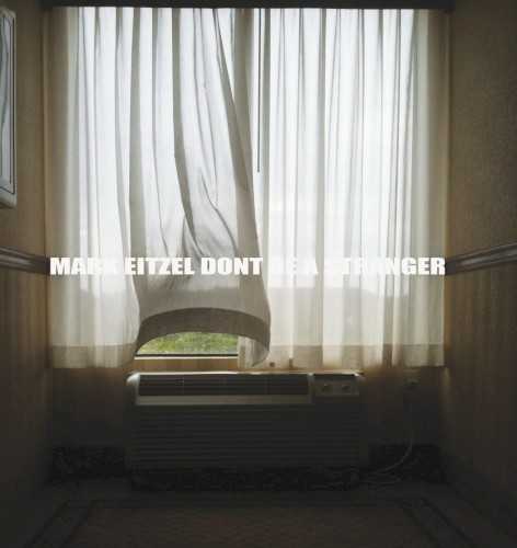 Allmusic album Review : Dont Be a Stranger appeared after a difficult period for the eternally gloomy Mark Eitzel -- following the release of American Music Clubs fine but overlooked 2008 album The Golden Age, the band fell apart, presumably for the last time, and after Eitzels solo album Klamath was (barely) released in 2009, little was heard from him until the spring of 2011, when it was revealed hed suffered a severe heart attack. So the mere fact that Eitzel is alive, well, and recording is encouraging news, and though Dont Be a Stranger is a few steps short of a triumphant return to form, its easily Eitzels strongest solo effort since 2001s The Invisible Man. Time has begun working some changes on Eitzels voice, smoothing out the grain of his instrument, easing up on its physical force, and suggesting a bit less control on numbers like "The Bill Is Due," "I Love You But Youre Dead," and "Nowhere to Run." But the intelligence of his phrasing is as impressive as ever, and his ability to inhabit his lyrics is complete. Eitzels songwriting remains his greatest strength, and if his last few solo efforts were unfortunately inconsistent, this shows the excellence of the material on The Golden Age was no fluke (and he revives one song from that set, "All My Love," found here in a jazzier piano-based arrangement). Eitzels witty but pointed self-loathing takes center stage on "Why Are You with Me" and "Oh Mercy," while his portraits of lives in the balance on "Youre Waiting," "Lament for Bobo the Clown," and "Nowhere to Run" confirm he hasnt lost his vision, or his flinty but sincere compassion. And fans put off by Eitzels (sometimes if not always successful) experiments with electronics will be encouraged by the warm, organic sound of this material, which suggests the spare, eloquent surfaces of AMCs more subdued work. (Vudi even pops up on one track.) Emotionally powerful, darkly beautiful, and troubling yet genuine at the same time, Dont Be a Stranger is the sort of album only Mark Eitzel could make, and if its not always as strong and as focused as one might hope, it honors his muse better than he has on his own in some time, and shows this master songwriter still has some worthy stories left to tell.