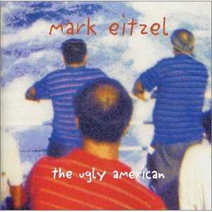 Allmusic album Review : After recording a set of idiosyncratically rendered cover tunes on 2002s Music for Courage and Confidence, Mark Eitzel has chosen to take a revisionist look at his own back catalog, with a decidedly unexpected twist, for this set. On The Ugly American, Eitzel has re-recorded nine songs he wrote during his tenure with American Music Club (along with one likeminded cover) in collaboration with a group of Greek musicians, who accompany him on bouzouki, mandolin, and zourna, as well as the more traditional guitar, bass, and drums. While at first the idea might sound like some sort of practical joke to some fans, the execution is genuinely impressive; the musicians are gifted and tasteful enough not to overstate the Hellenic accents of the new arrangements (especially Manolis Karantinis on mandolin and bouzouki and Manos Ahalinotopoulos on winds and reeds), and the mysterious Mediterranean sounds of the instruments mesh quite well with the minor-key moods of Eitzels songs, not unlike the work of another great failed romantic who came to love Greek music, Leonard Cohen. Best of all, Eitzels vocals are superb, sounding supple and beautifully modulated on every cut, and his English-language adaptation of producer Manolis Famellos "Loves Humming" suggests Eitzel found himself amidst kindred spirits during his stay in Athens. While Mark Eitzel probably wouldnt be well advised to take on Greek music as a full-time pursuit, The Ugly American is certainly a fascinating and pleasurable detour that casts some of his best songs in a new light, and once again demonstrates how beautiful and heart-wrenching they can be.