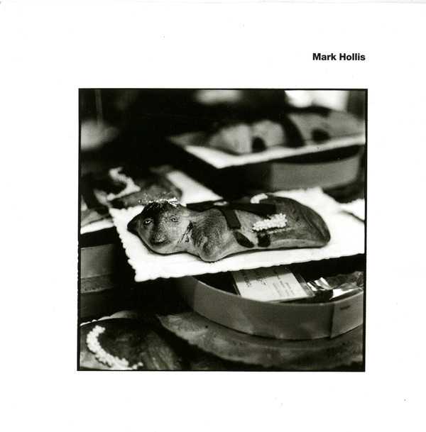 Allmusic album Review : Achingly gorgeous and hauntingly stark, Mark Hollis self-titled debut picks up where he left off with Talk Talks Laughing Stock seven years earlier, re-emerging at the nexus point where jazz, ambient, and folk music collide. Its quite possibly the most quiet and intimate record ever made, each song cut to the bone for maximum emotional impact and every note carrying enormous meaning. Hollis paints his music in fine, exquisite strokes, with an uncanny mastery of atmosphere thats frequently devastating. And if anything, his singularly resonant voice has grown even more plaintive with the passage of time, which -- combined with the understated artistry and minimalist beauty of tracks like "The Colour of Spring" and "Watershed" -- makes Mark Hollis a truly unique and indelible listening experience. His obvious understanding of the power of silence aside, one prays he doesnt again wait for the seven-year itch to strike before returning.