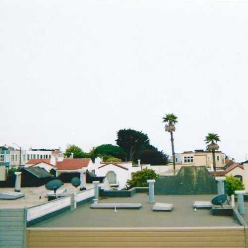 Allmusic album Review : Mark Kozelek recorded his self-titled 2018 full-length primarily at hotel rooms in his home city of San Francisco. Accompanied by an engineer, he looped and layered guitar parts and came up with the bulk of the lyrics on the spot. The tone is set by opener "This Is My Town," which details his experiences wandering around town, going out for dim sum, novels hes read, and how he can pick up any guitar and feel comfortable playing it -- pretty typical of the lyrical content for much of his work during the 2010s. During the course of the album, he continues discussing the comforts of home as well as the loneliness of being on tour and being apart from his girlfriend. He spends very little time socializing with other people, but when he does, it usually makes for some interesting stories. "My Love for You Is Undying" recalls an awkward encounter with a fan who claims that shes listened to Kozeleks music more than shes slept, and another with a bookstore clerk who claimed to be a huge fan but was then unnecessarily rude to him. He manages to balance absurd humor with self-deprecation on songs like "Weed Whacker," where a barista doesnt realize hes talking to Kozelek while a Sun Kil Moon album is playing in the background, and Kozelek later tells someone that he just makes music for the streaming services. Theres also the ever self-referential, introspective "The Mark Kozelek Museum," which suggests that Ariel Pink wouldve been as famous as David Bowie if he was around in 1975, then somehow drifts into a multi-tracked chant of the word "diarrhea." On "666 Post," his loneliness leads to dementia, leading him to imagine having unusual pets and Satan being his neighbor. Much more relaxed is the unhurried "The Banjo Song," which does not contain any banjos, but a soothing back-and-forth nylon-string guitar pattern, atop which Kozelek lists his comfort movies and favorite possessions. As on this song, the albums guitar work is typically pretty and atmospheric, sometimes switching into darker chords for certain verses, but generally maintaining a light, nostalgic tone. The only guest musician is Steve Shelley, who plays drums on "Sublime," which of course mentions the fact that Brad Nowell died in San Francisco, not far from where Kozelek lives. Mark Kozelek is as long and rambling as one would expect from the singer/songwriter, but his mixture of poignancy, humanity, and levity continues to make his music worth hearing.