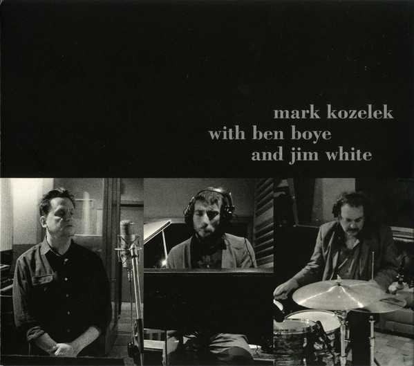 Allmusic album Review : Mark Kozeleks fifth release in 2017 was created with keyboardist Ben Boye (who appeared on both of the years Sun Kil Moon albums in addition to numerous recordings by Bonnie "Prince" Billy and Ryley Walker, among others) and Dirty Three drummer Jim White. Almost immediately, Boye and White seem like a much better, more fitting match for Kozelek than some of the musicians hed previously collaborated with during the preceding few years. The albums with Jesu clearly sound like Kozelek singing/speaking on top of Justin Broadricks electronic backing tracks, and Steve Shelleys drums on Common as Light and Love were highly repetitive loops. Here, the three musicians clearly seem like theyre all in the same room, feeding off of each others creative energies. This is most readily apparent during the 15-minute "Topo Gigio" (about Kozeleks childhood stuffed pig, named after the mouse puppet from The Ed Sullivan Show), during which he pauses from his observational rambling to let the music take over. At the end of the piece, the music becomes more furious, and Kozelek becomes more enraged and imitates missiles being launched, crying out "The tension is escalating!" On other tracks, the musicians seem to flow in an ambling, abstract groove, switching things up when Kozelek changes thoughts or moods. Typical of his post-Benji style, Kozeleks lyrics are a mixture of hopefulness, disgust with the state of the world, reflections on his daily life, remembrances of friends and acquaintances, and moments of goofiness and levity. He also really adores and envies cats. "House Cat" is told from the point of view of a fat, lazy house cat who wonders why all the humans keep arguing so much, or what that orange guy on the television screen is yelling about. At least half of the other songs mention felines in one way or another. Elsewhere, he reflects on everyones differences during "Blood Test," eventually encouraging people to reject hate culture and "rise above." On "Los Margaritos," he apologizes to family members for the foul mood he was in while they took him out for dinner the previous night. "The Black Butterfly" is a surrealist tale recalling a dream where Elliott Smith was still alive and had a kid who was in danger of failing the third grade, and he invited Kozelek to tour with him. Inevitably, the nearly 90-minute album goes on longer than it needs to, with the slow, boring "February Rain" being the most skippable track. Even still, the albums best moments are insightful and touching, and for anyone following the strange path his music has taken, its still worth hearing.