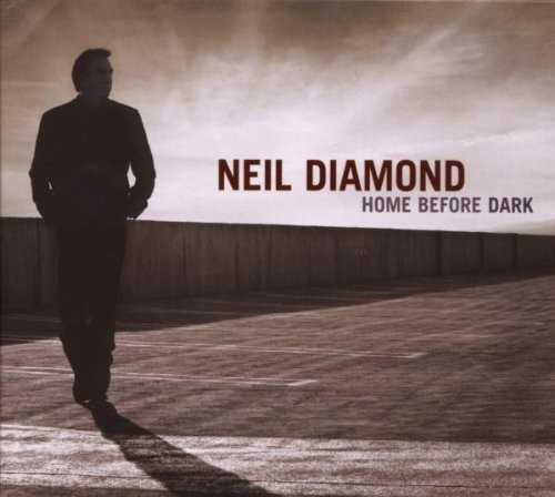 Allmusic album Review : Home Before Dark is Neil Diamonds second collaboration with producer Rick Rubin. It follows the fine but ill-fated 12 Songs, which was sabotaged by Sonys "Rootkit" program scandal: a nefarious bit of "copy protection" software that invaded the operating system of PCs and wreaked havoc. 12 Songs had to be recalled from store shelves just as Diamond received better reviews than he had in a decade. Sony reissued it in 2007, but the damage was done. Diamond, disappointed but undaunted, sought out Rubin. Rubin enlisted Heartbreakers keyboardist Benmont Tench and lead guitarist Mike Campbell, studio guitarist/bassist Smokey Hormel, and former Chavez guitar slinger Matt Sweeney. There are no drums. David Campbell did some skeletal string arrangements, but thats it. In addition, Natalie Maines of the Dixie Chicks duets on the track "Another Day (That Time Forgot)." Home Before Dark is a more exposed Diamond than listeners have ever heard. Hes out there, bashing on his guitar and singing from a position of extreme vulnerability; hes on a wire without a net. His musicians understand what is so dynamically and poetically evident in the songs, and use painterly care in adorning them. Diamond is not a young man anymore and, thankfully, he doesnt write like one -- though he sounds lean and hungry for something just out of reach. "Forgotten" has a rock & roll progression worthy of his Bang singles. Its lyric reflects the travails of a protagonist whose heart bears hurt without the grace and wisdom that age is supposed to bring. The grain in his voice is fierce; it quavers just a bit in the refrain, and Sweeneys electric guitar nails it to the wall. It follows "One More Bite of the Apple," another rollicking rocker, but this one is about reuniting with his true beloved -- songwriting itself.<br><br>Home Before Dark contains some beautiful love songs, too. "If I Dont See You Again," the albums opener, reflects the bittersweet aftertaste of lost love. Its classic Diamond. His character converses with a reflection, a ghost. The gorgeously crafted instrumental bridge and the sense of loneliness in the protagonists voice combine seamlessly. The albums first single is "Pretty Amazing Grace." Diamond sings a prayer of gratitude for rescue and restoration, whether to Divine Providence, his lover, or both; we dont know. His infectious, haunting melody is jarring, played in minor chords by fingerpicked steel-string guitars and anchored by a standup bass. Tenchs piano adds tension just before the refrain where the guitars get punchy flamenco-style and break it wide open. Strings decorate the backdrop, as the lyric juxtaposes the present against the past, not as contrast but as progression. The duet with Maines, "Another Day (That Time Forgot)," has shadowy traces of the gentle but brooding intensity of the intro to "Holly Holy" in the chord progression. Its a joint confession between lovers who are lost to one another; the tragedy is they have no idea how they grew apart. Tenchs piano improv fills the space between verses; he underscores the melancholy gorgeously. "The Power of Two," with multi-tracked, entwining acoustic guitar lines by Campbell, is an artful framework for one of Diamonds protagonists to realize that he finally has the ability and courage to embrace another fully, and to allow himself to become a part of love instead of remaining apart from it. Home Before Dark is a less "civilized" album than anything Diamonds done before. It is a stark and moving portrait of what an accepted artist found when he reached all the way down to face his fear, doubt, and knowledge, and brought the discovery into his work. Diamond proves not only that can he still write great songs, but also that he can deliver them with toughness and grit as an expression of real beauty.