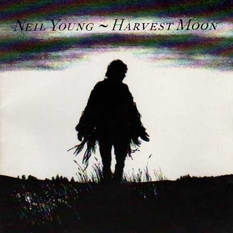 Allmusic album Review : After 20 years, Neil Young finally decided to release the sequel to Harvest, his most commercially successful album. Harvest Moon is in some ways a better album, without the orchestral bombast that stifled some of the songs on the first album and boasting a more diverse overall selection of songs. Harvest Moon manages to be sentimental without being sappy, wistful without being nostalgic. The lovely "Unknown Legend," "From Hank to Hendrix," and the beautiful "Harvest Moon" are among Youngs best songs. Only the overlong (11 minutes) and oversimplified "Natural Beauty" hurts a beautiful album that proudly displays scars, heartaches, and love.