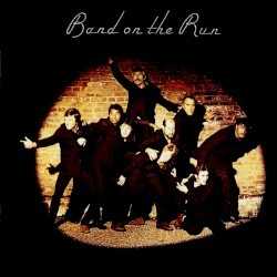 Allmusic album Review : Band on the Run is generally considered to be Paul McCartneys strongest solo effort. The album was also his most commercially successful, selling well and spawning two hit singles, the multi-part pop suite of the title track and the roaring rocker "Jet." On these cuts and elsewhere, McCartneys penchant for sophisticated, nuanced arrangements and irrepressibly catchy melodic hooks is up to the caliber he displayed in the Beatles, far surpassing the first two Wings releases, Wild Life and Red Rose Speedway. The focus found in Band on the Run may have to do with the circumstances of its creation: two former members quit the band prior to recording, leaving McCartney, wife Linda, and guitarist Denny Laine to complete the album alone (with Paul writing, producing, and playing most of the instruments himself). The album has the majestic, orchestral sweep of McCartneys Abbey Road-era ambition, with a wide range of style-dabbling, from the swaying, acoustic jazz-pop of "Bluebird" and the appealing, straightforward rock of "Helen Wheels" to the wiry blues of "Let Me Roll It" and the swaying, one-off pub sing-along "Picassos Last Words (Drink to Me)." Though it lacks the emotional resonance of contemporaneous releases by John Lennon and George Harrison, McCartneys infallible instinct for popcraft overflows on this excellent release.