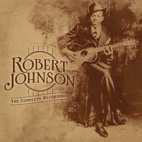 Allmusic album Review : In practical terms, there’s not much need for Robert Johnson’s The Complete Recordings: The Centennial Collection. There are no undiscovered master or alternate takes, new remastering can only improve the original acetates and 78s so much, and apart from the sequencing of alternate takes after the masters, a debatable merit for listenability, the original 1990 box set The Complete Recordings did everything right. So, The Centennial Collection exists to celebrate Johnson’s 100th birthday, and to offer improved sequencing and sound, both of which are evident on the double-disc set that provides the foundation for this entire reissue project. As strong as this compilation is, what’s really noteworthy in this centennial celebration is the box set designed for the very wealthy among us, a handsome, lavish fetish object for collectors coming complete with a hardcover book containing 45-rpm replicas of the original 78-rpm singles; a double disc of Johnson’s originals; a double disc of Rarities from the Vault that places Johnson into the context of his times by offering a disc of blues cut between 1928-1932 and a disc of Texas country, folk, and Mexican music; and then a DVD documentary of Johnson’s legacy. Naturally, this luxurious item is more attractive and interesting than its bare-bones companion, but it doesn’t necessarily offer greater musical insight than its slimmer cousin. Johnson’s legacy can fit onto a mere two discs, so the rest of the set is essentially well-dressed extras, with the two CDs of contemporary blues, country, and folk offering a nice sampling of Johnson’s peers even if they’re by no means extensive. And when you spring for a set of this magnitude, what matters isn’t the content so much as the presentation -- and in that regard, the four-disc set is impeccable.