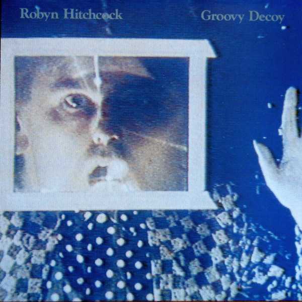 Allmusic album Review : Four years after its release, Robyn Hitchcock pulled Groovy Decay from circulation, replacing it with Groovy Decoy, an alternate version of the record assembled mainly from demos he recorded with Soft Boys bassist Matthew Seligman; the album included some versions that are identical to the Decay material, as well as a handful of new songs. By and large, Groovy Decoy is a better record, with more immediate and gripping versions of the songs that comprised the original album, but the material remains some of the weakest Hitchcock has written.