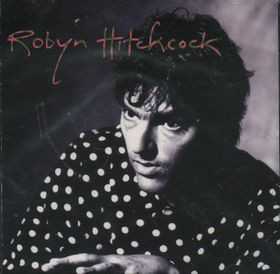 Allmusic album Review : Eponymous albums usually herald a debut or a stylistic sea change. Robyn Hitchcocks 22nd studio LP is neither, but it embraces elements of both. Recorded in Nashville with pop sorcerer Brendan Benson, its a distillation of the 64-year-old surrealists entire career, and easily his most vibrant collection of new music since the early 1990s -- his last outing, 2014s Man Upstairs, saw Hitchcock delivering an enjoyable, yet relatively amorphous set of half-covers/half-originals under the tutelage of the great Joe Boyd. The obvious reference points here are Underwater Moonlight-era Soft Boys and early solo outings like Element of Light and Black Snake Diamond Role, but there are more than a few tips of the hat to his time on A&M; in the late 80s -- lead single "I Want to Tell You About What I Want" wouldnt have sounded out of place on Globe of Frogs or Queen Elvis. Always an underrated and inventive guitar player, Benson gives Hitchcock plenty of room to flex his six-string muscles, and he digs into psych rock/jangle pop confections like "Virginia Woolf," "Detective Mindhorn," "Time Coast," and "Mad Shelleys Letterbox" with the fleet-fingered, double-tracked glee of a man who just rediscovered Revolver. Hitchcocks adopted hometown of Nashville looms large on the Grant-Lee Phillips-assisted, pseudo-honky tonk number "I Pray When Im Drunk," and Russ Pahls weepy pedal steel paints golden sunsets over the lovely "Sayonara Judge" and the equally breezy "1970 in Aspic," but as Hitchcock states in his typically verbose liner notes, his songs are "English myths, seen from abroad." Nowhere is that more apparent than on "Raymond of the Wires," a eulogy for his novelist, screenwriter, and cartoonist father, and an elliptical, psych-pop mini-masterpiece that skillfully wields both nostalgia and wonder. No longer the hyper-prolific, Byzantine food-, sex-, and death-obsessed Syd Barrett-phile of old -- well, maybe just a little bit -- Hitchcock has settled into a sort of seasoned eccentricity, and this economical, late career gem proves that hes still got plenty of Madcap Laughs left in the hopper.