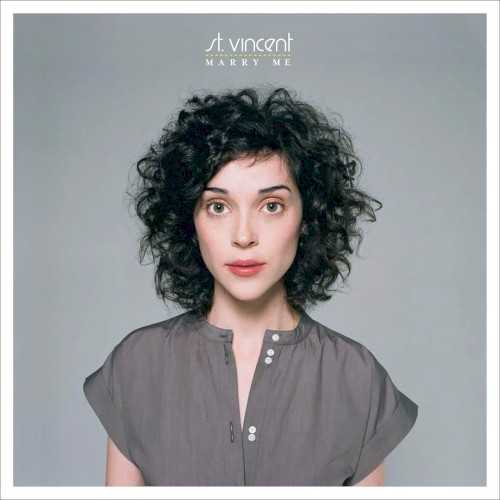 Allmusic album Review : With experience playing with the Polyphonic Spree, Sufjan Stevens, and Glenn Branca, Annie Clark is more than qualified enough to start writing her own loosely ornate, lush pop songs. But while Clark, who chooses to use the name St. Vincent here, does incorporate the frilly strings and horns, background choirs, and various keyboards (most of which she plays) of her past employers in Marry Me, her solo debut, she also has an edge to her -- something that shows up in the distorted electric guitar solos of "Jesus Saves, I Spend" or "Now, Now," the drums in the ominous "The Apocalypse Song" or "Your Lips Are Red," the growing intensity of the vocals "Landmines," the funereal waltz of the fantastic "Paris Is Burning" ("I write to give the war is over/Send my cinders home to mother," Clark sings sadly over electronic drumbeats and acoustic guitars) -- that pushes her away from the overly sentimental and quaint. Not that Marry Me doesnt have its fair share of happy love songs ("All My Stars Aligned," "What Me Worry?"), but the album isnt seeped in that kind of joyfulness that sings blind and insincere. Its an mix of good and bad, of light and dark, of the woman who purposefully sets up the obstacles she must get through to find her lover ("Im crawling through landmines/I know cause I planted them," she sings disarmingly), of sweet self-deprecation ("Marry me, John, Ill be so good to you/You wont realize Im gone"), honest and quirky and totally enticing. Clark is young enough that shes still able to retain that sense of wonder about the world without seeming naïve, and old enough that she can say things like "My hands are red from sealing your red lips" and you believe her. Its an orchestral record for those who prefer the simplistic, a darker one for those who prefer theirs twee, love songs for the scorned and sad songs for the content, an engaging and alluring combination that makes Marry Me nearly irresistible, and one of the better indie pop albums thats come around for a long time.