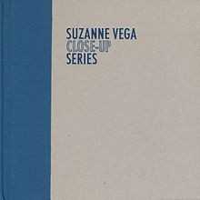 Allmusic album Review : In 2010, celebrated singer and songwriter Suzanne Vega launched an ambitious project she called the Close-Up series; it was a series of four albums, released over the space of two years, in which Vega re-recorded favorite songs from her back catalog in spare, acoustic-based arrangements, with the song selection for each album determined by theme. Close-Up, Vol. 1: Love Songs dealt with love and relationships, Close-Up, Vol. 2: People & Places was dominated by story-songs that focused on characters and locations, Close-Up, Vol 3: States of Being concerned emotional and psychological subjects, and Close-Up, Vol. 4: Songs of Family focused on the bonds of family as well as the joys and sorrows of marriage. The Close-Up Series is a special box set that includes the four Close-Up albums in full; in addition, the set includes a bonus disc that collects extra tracks that were included in certain digital releases of the albums, as well as a DVD of Vega performing a solo acoustic show at New Yorks City Winery.