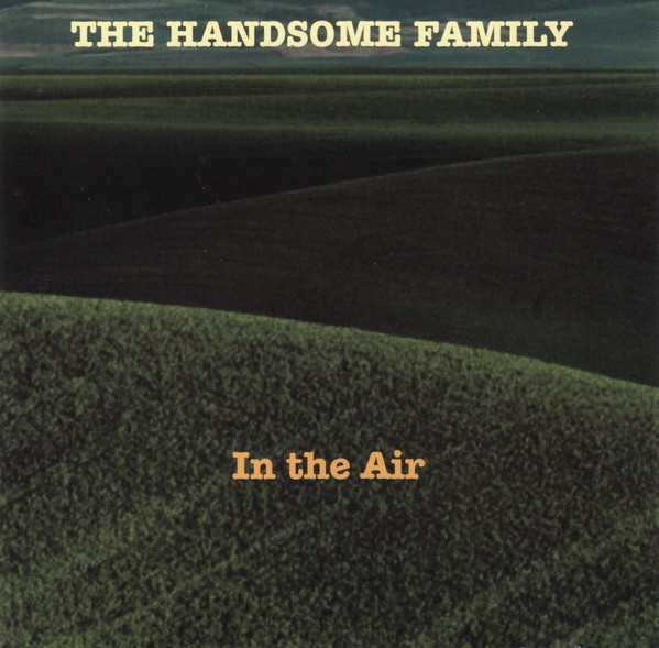 Allmusic album Review : If their last album, Through the Trees, came to us from the darkness at the bottom of a well (or a liquor bottle), In the Air is the sound of the Handsome Family after they made it out of the depths and up onto the grass -- and are now adjusting to a less desperate life. Not to say that its sunny. Lyricist Rennie Sparks still presents us with dark and bloody tragedies, as well as whimsical fairytales about lonely, but hopeful figures. The difference between In the Air and the Handsome Familys last album seems to be the presence of a calm (as opposed to disturbed restraint) and a certain warmth pervading this album. Brett Sparks vocal delivery comes across as more relaxed and natural and in lieu of the occasional, creepy vocal effects used on the last album. The colorful, sad, and disturbed scenes are often delivered with a country flavor and a folk instrumentation, and include songs that are the rightful offspring of Appalachian murder ballads, such as "My Beautiful Bride" and "Up Falling Rock Hill," and southern hymns ("Never Grow Old"). The Handsome Familys songs are imbued with a tender romanticism and love of the fantastic -- and of a world that, for all its real twists and sadness, still holds moments of childlike wonder and magical possibilities.<br><br>In the Air was recorded, as were their three previous albums, in the Handsome Family living room, this time with live percussion (provided by Brett) instead of a drum machine. Also heard are guest musicians Darrell Sparks, who sings backup and plays guitar on two songs, and violinist Andrew Bird (formerly of the Squirrel Nut Zippers, leader of his own roots music-based band) who contributes to "Poor, Poor Lenore," "Up Falling Rock Hill," and "When That Helicopter Comes," a hellfire and brimstone, foot-stomping number with a sparse, bluegrass delivery: "Its gonna rain champagne/and the hills are gonna dance... The sky will swim in lightning fire and the trees will shake and scream."