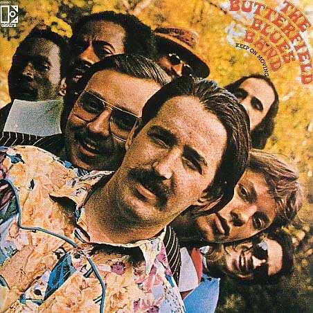 Allmusic album Review : Released in 1969, Keep on Moving was the fifth Elektra release by the Paul Butterfield Blues Band. During a four-year span the groups namesake and leader was the only original member left from their first album in 1965. Morphing in a similar direction as Michael Bloomfields Electric Flag, this edition of the Butterfield Blues Band prominently fronted the horn section of David Sanborn on alto sax, Gene Dinwiddie on tenor, and Keith Johnson on trumpet. The bands direction was full tilt, horn-dominated soul music, first explored on The Resurrection of Pigboy Crabshaw, which took them farther away from the highly regarded gritty blues experimentation of East-West and the duel guitar attack of Michael Bloomfield and Elvin Bishop. This album also signaled the final appearance of AACM and Art Ensemble of Chicago drummer Phillip Wilson, whose Butterfield swan song was the collaboration with Dinwiddie on the hippie gospel track "Love March," of which an appropriately disjointed live version appeared on the Woodstock soundtrack album. The difference between Butterfields 1965 street survival ode "Born in Chicago" ("My father told me son youd better get a gun") and "Love March" ("Sing a glad song, sing all the time") left fans wondering if the band had become a bit too democratic. However, on cuts like "Losing Hand," some of the bands original fervor remains. Butterfields harp intertwining with the horn section sounds like a lost Junior Parker outtake and the Jimmy Rogers penned "Walking by Myself," is the closest this band comes to the gutsy Windy City blues of its heyday. The remaining tracks arent horrible, but tend to run out of ideas quickly, unfortunately making what may have been decent material (with a little more effort) sound premature. Butterfield would make a few more personnel changes, release one final disc on Elektra, Sometimes I Just Feel Like Smilin, and then dump the band altogether to embark on a solo career. In 2006, Sundazed released a High-Definition Vinyl LP version of Keep on Moving.