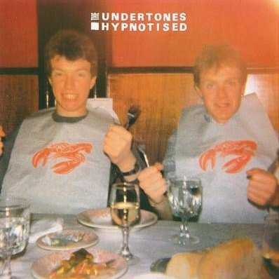 Allmusic album Review : Its hard to follow up a classic, as the Undertones themselves well knew, starting their second album with the endearingly self-effacing "More Songs About Chocolate and Girls," a song that acknowledges the difficulty of writing and recording a second album after the unexpected popularity of your first. Surprisingly, the lads make a good job of it; Hypnotised is only barely less perfect than the debut, and even the primary flaw, a pointless and rushed cover of "Under the Boardwalk," has its charms. Other than that misstep, the album contains 14 punky pop classics, with a slightly tougher edge than the unfailingly sweet-natured debut. The giddy love rush of the title track is matched by some of Feargal Sharkeys most exuberant vocals, and the snotty "Whats with Terry?" and "My Perfect Cousin" are yet more perfect slices of adolescent frustration.