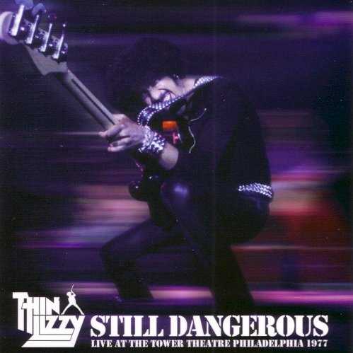 Allmusic album Review : Thin Lizzys Live and Dangerous album ranks among the most beloved and, if you believe the gossip, the most controversial concert recording of its age. On the surface, it is dynamic -- four vinyl sides of pure Lizzy gold. But underneath, who knows what studio trickery was employed to make the electricity crackle so loudly? The band shrugged and said very little; the producer claimed a lot, and the truth could be anywhere in between. Well, stop fighting. Live and Dangerous was a compilation drawn from a string of gigs recorded during 1976-1977; Still Dangerous zeroes in on just one, from the tail end of that span, and if you truly believe there are any critical differences between the two, then maybe you should find other ways of occupying your time. Seven songs (but not performances) carry over from one disc to the other -- you can probably guess which ones they are -- and in terms of energy, drive, and sheer exhilaration, theres not a sliver of daylight between them. "Jailbreak," all howling sirens and screaming guitars, is sensational (even if Phil Lynott does muff the occasional line); "Dancing in the Moonlight" is as coiled and sensuous as it ought to be; "Dont Believe a Word" is manic defiance. And then theres that indelible moment of magic that raised a Lizzy concert so high above the competition that it wasnt even worth going to see another band, a soaring "Cowboy Song" slipping deftly and deliberately into "The Boys Are Back in Town," while the entire audience self-combusts with joy. In other words, Live and Dangerous is still one of the greatest live albums ever made. And Still Dangerous is one of the greatest concert recordings. Its as simple, and brilliant, as that.